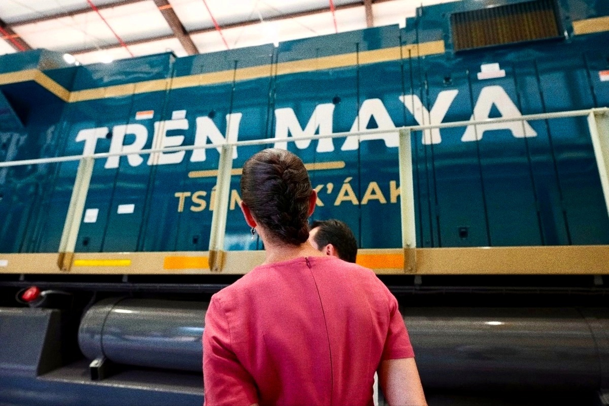 President Claudia Sheinbaum views a Maya Train cargo locomotive in Puerto Morelos