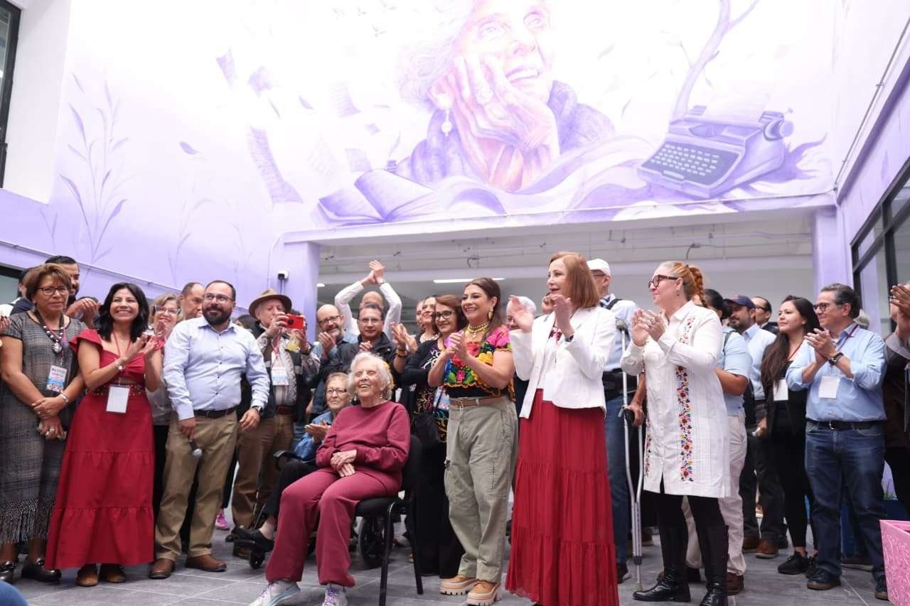 Inauguration ceremony with attendees applauding
