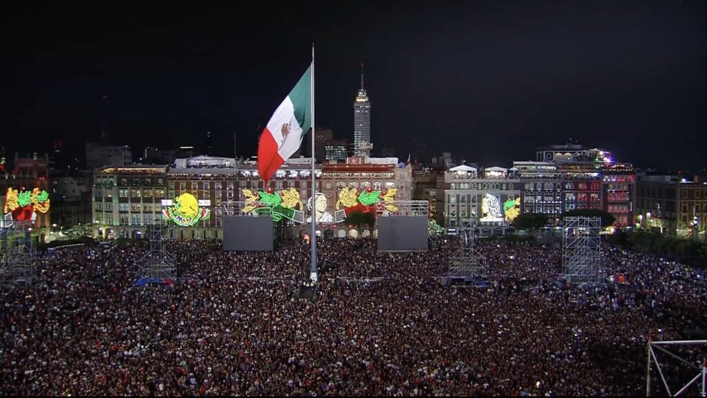 Crowds fill the Zócalo under the giant Mexican flag for the Grito de Independencia
