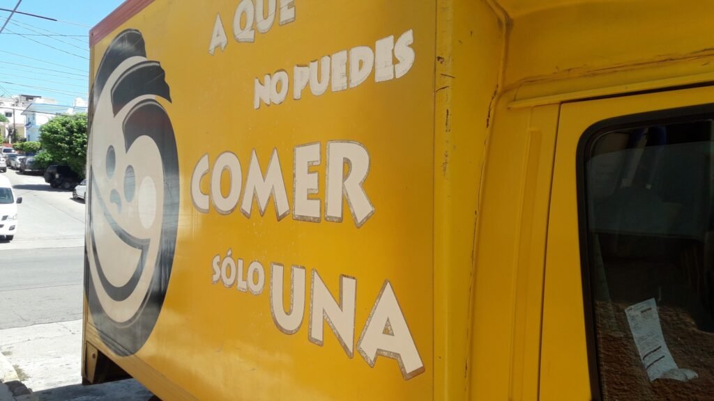 A Sabritas snack delivery truck parked on a street in Mazatlán